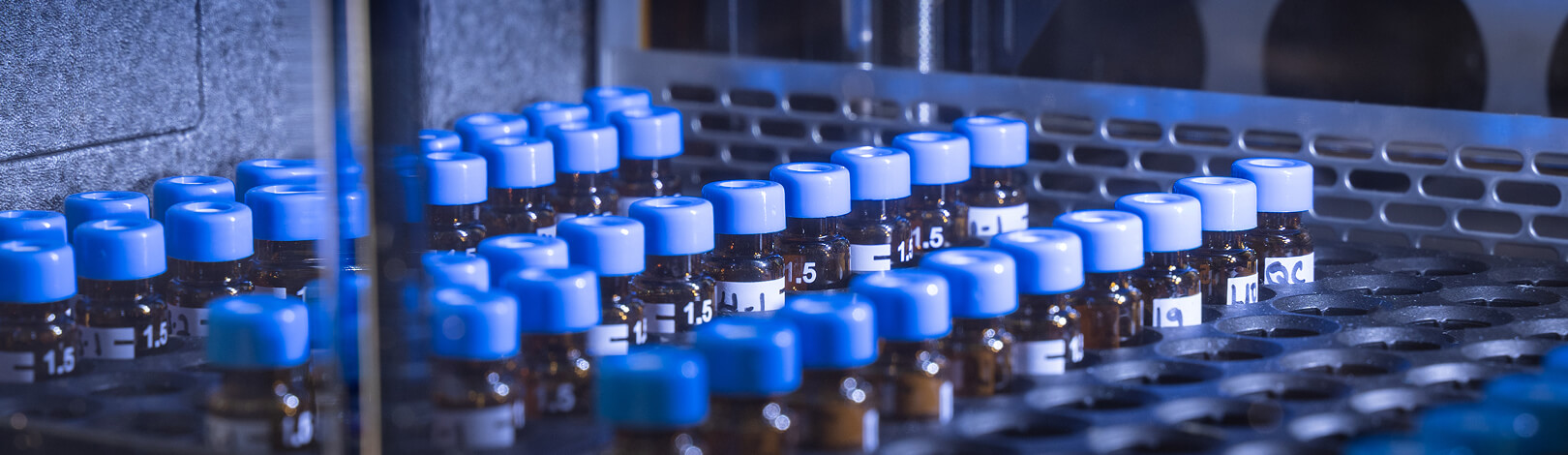Three rows of samples in a tray await allergen testing at a supplement testing lab.