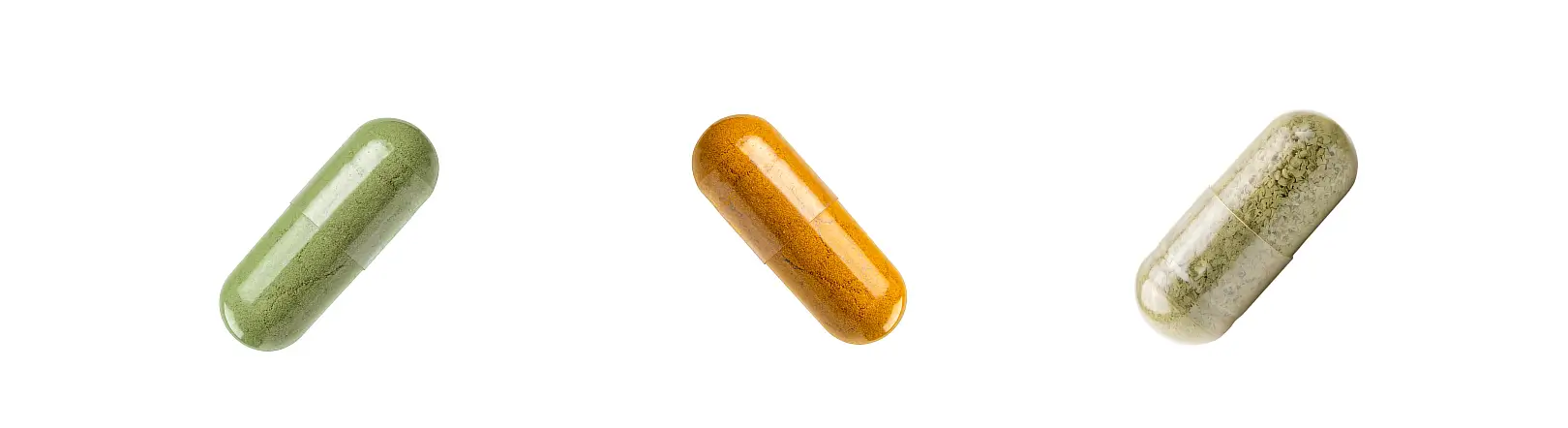 Three herbal supplement capsules in green, orange, and transparent colors isolated on a white background for third party laboratory testing