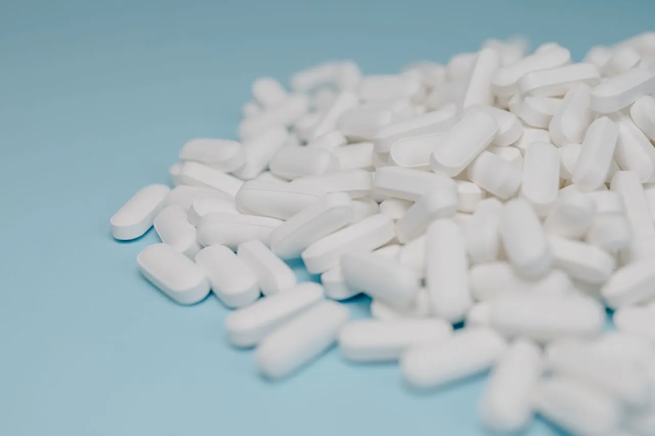 close up of white supplement pressed pills for third-party lab testing